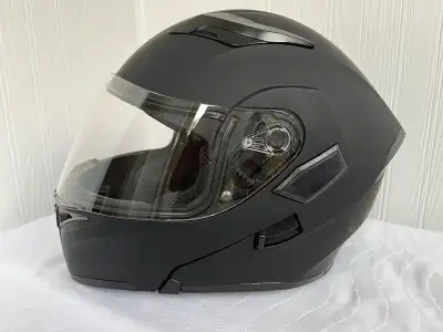 ILM motorcycle helmet in flat black Size M Modular with built in sunvisor Comes with storage bag New...