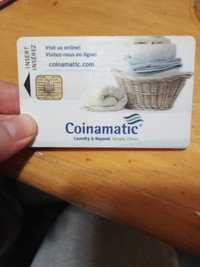 Coinamatic Laundry card with $20 on it
