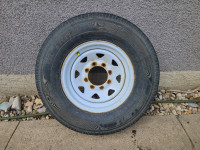 Used Trailer tire with 8 bolt rim ST235 80 R16
