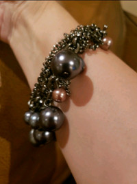 Grey metallic beaded charm bracelet 