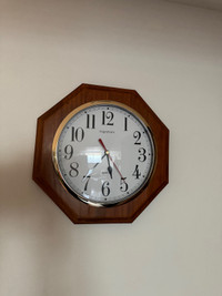 Clock with wood trim