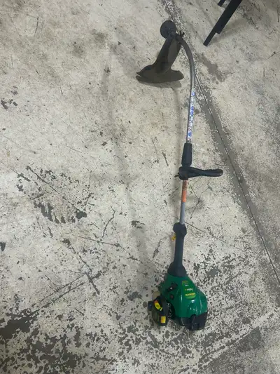 Get your lawn in shape with this used Craftsman gas powered weed wacker, perfect for tackling unruly...