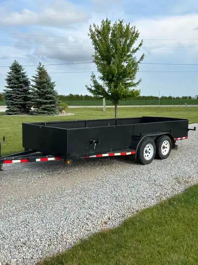 Tandem 3500 lbs axle trailer Wood deck and steel walls Little surface rust but nothing major, great...