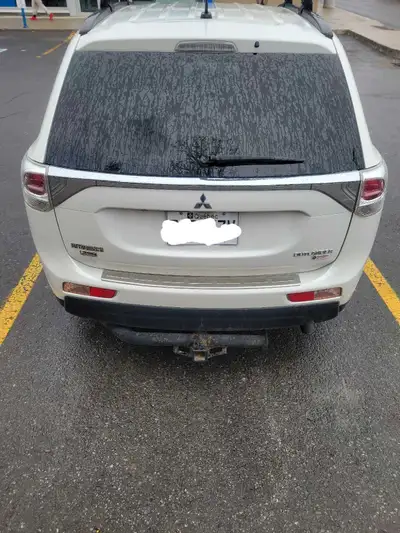 2014 mitsubishi outlander v6 7 seats full option. As on pictures needs tlc on for somebody who dosn'...