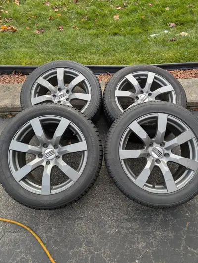 One Set of 4 Winter Rims and Tires - 90% Tread on the tires. Firestone Winter force Tires. *Minor We...