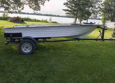 The price 850$ is for the Boat and the engine. The trailer is 1000$. 14ft Fiberglass Fishing Boat —...