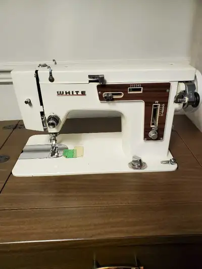 Sewing machine with cabinet, View more
