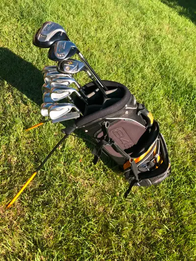 12 Taylormade Golf clubs right handed set with a standing bag, View more