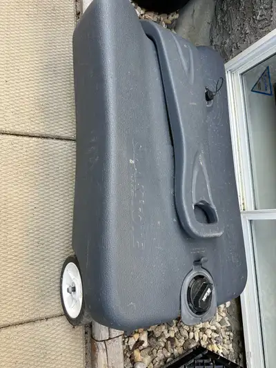 This is a used Thetford 27-gallon portable waste holding tank, perfect for camping or RV use. It's d...