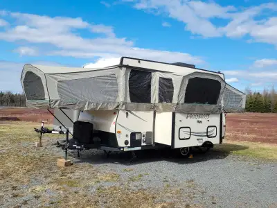 SALE PRICE ON NOW...SAVE $3000...... This pop up isn't just a normal tent trailer..It has higher sid...