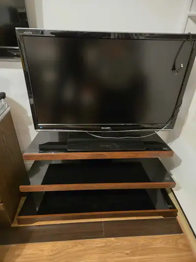42" SHARP FLAT TV,WITH GLASS STAND, View more