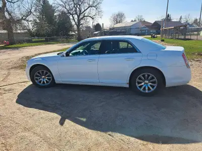 Excellent condition 2013 Chrysler 300 3.6L V6 with 132,000km Fully loaded interior with sunroof, con...