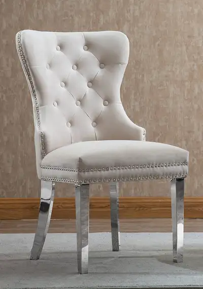 DESIGNER DINING CHAIRS WITH CHROME KNOCKER IN VELVET SET OF TWO., View more