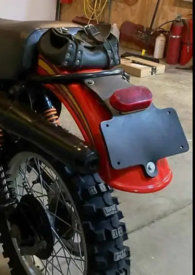 Looking for Vintage Can Am parts ......looking for the rubber license plate holder , a 14 tooth fron...