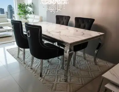 White Marble Dining Table with Chrome Base and Black Chairs , View more