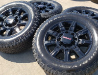 A110. 2024 GMC Sierra AT4 3500 OEM  black rims and tires