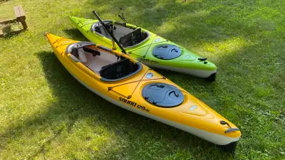 Excellent condition Elie Sound 120XE kayaks Comes with paddles Price is for both