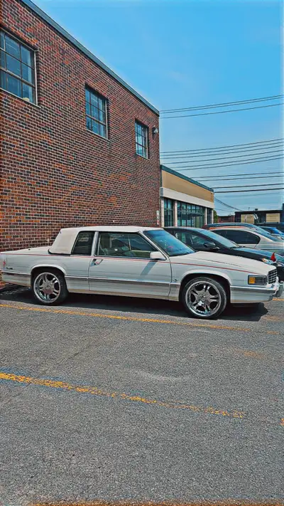 103000 kilo la seul au qc coupe deville 1993 systeme de son mags 20 pouces et mags original aussi bl...