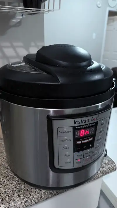 This is a used Instant Pot, a versatile kitchen appliance for quick and easy cooking, offering multi...