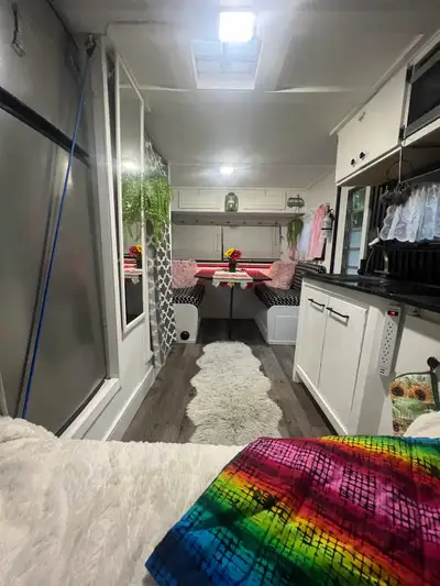 Cozy vintage trailer ready for new adventures! This little gem is fully solar-powered and off-grid c...