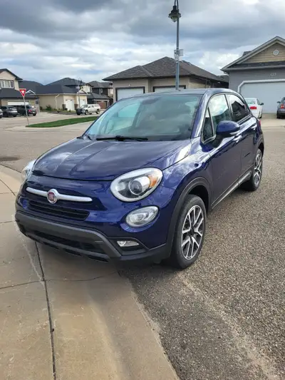 AWD, 4 door with rear hatch subcompact crossover SUV. 2.4 L gas engine with 9 speed automatic transm...
