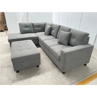 New Branded 6 seater sectional sofa and ottoman in fabric 