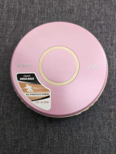 Listen to your favourite CDs on the go with this pink Sony CD Walkman portable CD player. This item...