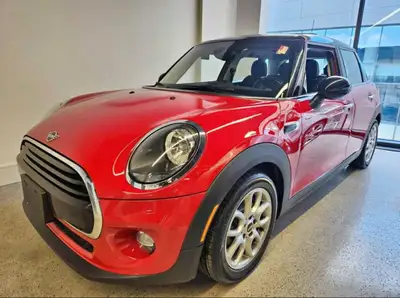 Selling my beautiful 2019 Mini Cooper in striking red! • 70,000 miles • No accidents • Car has Apple...