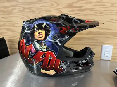 This Rockhard dirt helmet is in like-new condition, sporting a wicked AC/DC theme that's sure to tur...