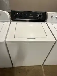 Whirlpool top load washer with black control panel 