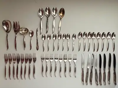 Vintage 48-Piece 1847 Rogers Bros. IS Flair Silverware, View more
