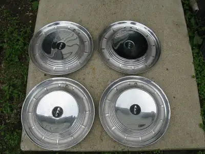 1 set of 4 full wheel 14" hubcaps for 1958 Edsel Ranger\Pacer One has some curb rash but all are pre...