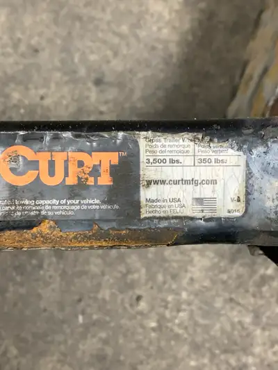 Used Curt trailer hitch off a 2011 Dodge Charger. Not bent just a bit rusty. Picture shows weights f...