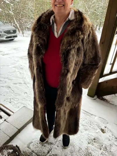 Raccoon Fur Coat - warm , you bet ! Size 10-12 Length at back : Back collar to bottom of coat 48” Ve...