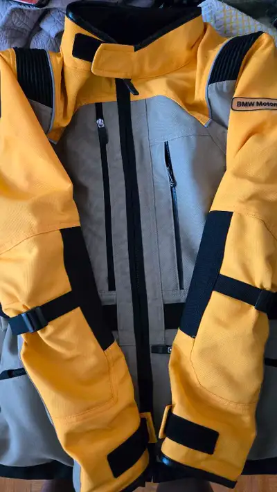 I am selling my BMW Motorrad Santiago motorcycle riding jacket along with a Nolan N102 helmet. This...