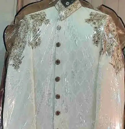 Wore only once. Selling whole set(includes sherwani, kulla, scarf) Small size. Nice jewel work. Dece...