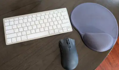 Bluetooth keyboard, bluetooth mouse and a lightly-used mousepad (optional) Both used once and are li...