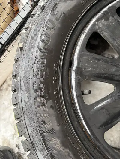 Bridgestone Blizzaks mounted on styled steel rims Size: 225/60R17 Tread: 11/32nds DOT: 1023 Bolt Pat...