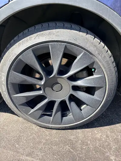 Four original TESLA Model Y 20” induction MAGS and Michellin winter tires. Tread depth 6-7/32 in ver...