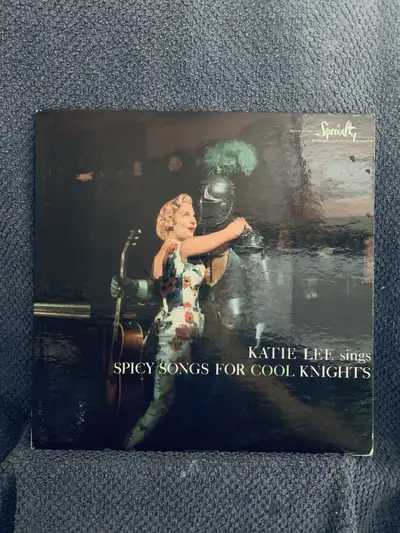 This is a vintage pressing of Katie Lee's "Spicy Songs for Cool Knights" on vinyl. Label: Specialty...