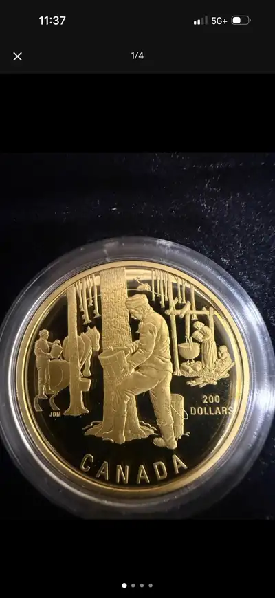 I'm selling a 1995 $200 gold coin Coin is mint and in a capsule complete with original box and COA M...