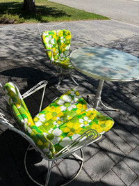 Metal patio set with glass top and cushions 