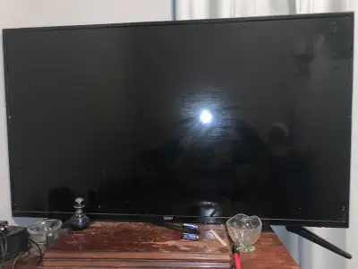 52" seiki flat screen tv with Harmon Kardon/Samsung soundbar/sub, View more
