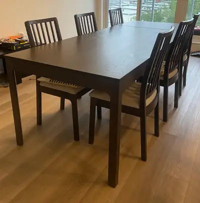 IKEA extendable dining table set with 6 chairs included., View more