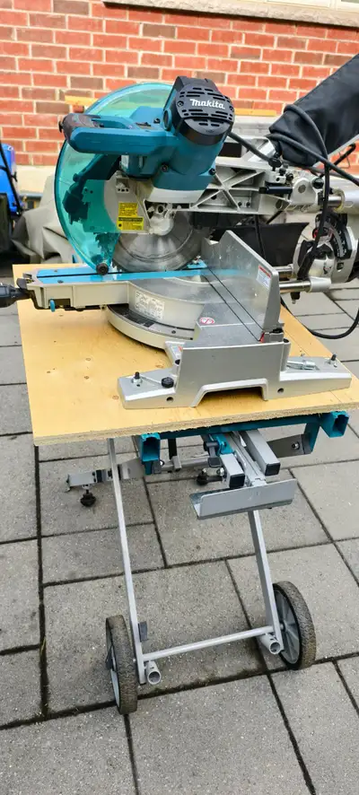 10" Sliding Compound Mitre Saw With Laser and stand Up To 12" Cuts In 2x Material, 6-5/8" Nested Cro...