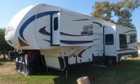 2011 Grand Junction 300 RL 5th Wheel with a King Bed