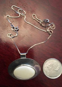 Collection of Sterling Silver Necklaces  (see pictures).