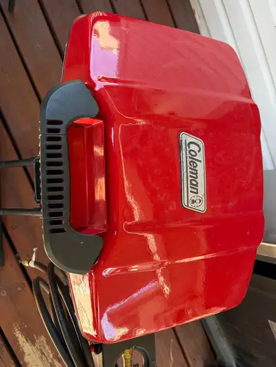 Collapsing bbq modified to hookup directly to the exterior propane outlet on your travel trailer. In...