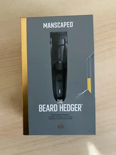 I'm selling a new Manscaped Beard Hedger, an electric beard trimmer designed for grooming and mainta...