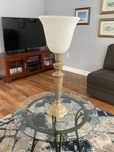 Torchiere style table lamp for sale from a smoke free home. Lamp is 27 inches tall and is made of a...